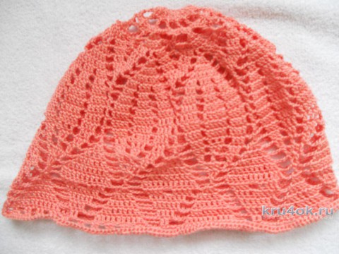 Персиковая ажурная шапочка для девочки